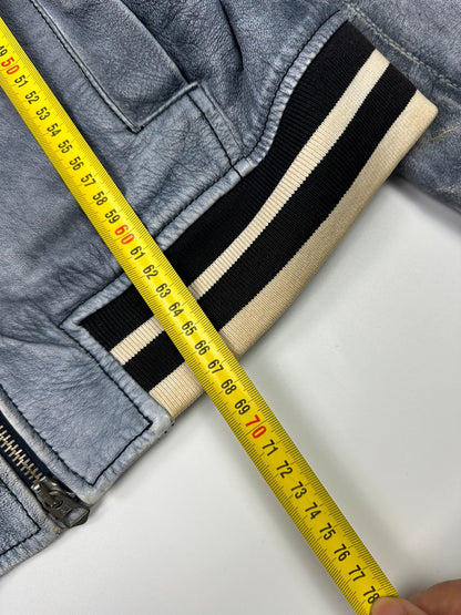 Armani blue and purple bomber jacket, eroded leather, vintage 2000s style.