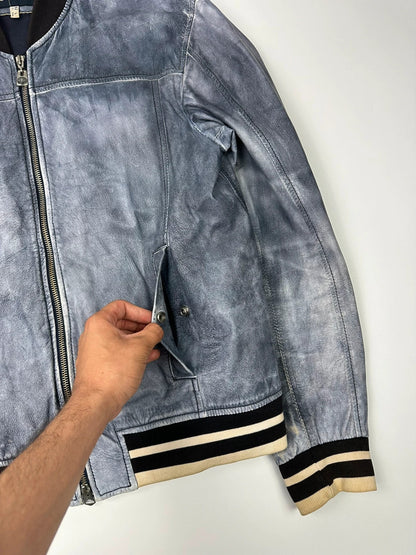 Armani blue and purple bomber jacket, eroded leather, vintage 2000s style.