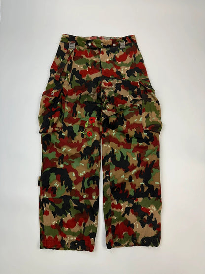 Dolce & Gabbana green camo wide-leg trousers with reworked straps and military pattern.