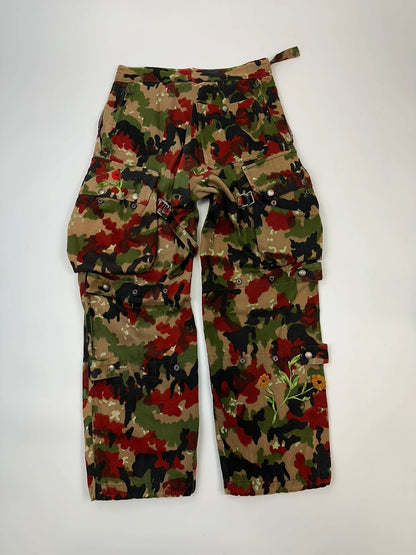 Dolce & Gabbana green camo wide-leg trousers with reworked straps and military pattern.