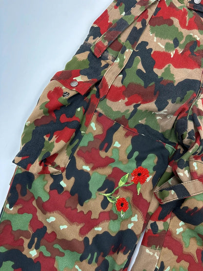 Dolce & Gabbana green camo wide-leg trousers with reworked straps and military pattern.