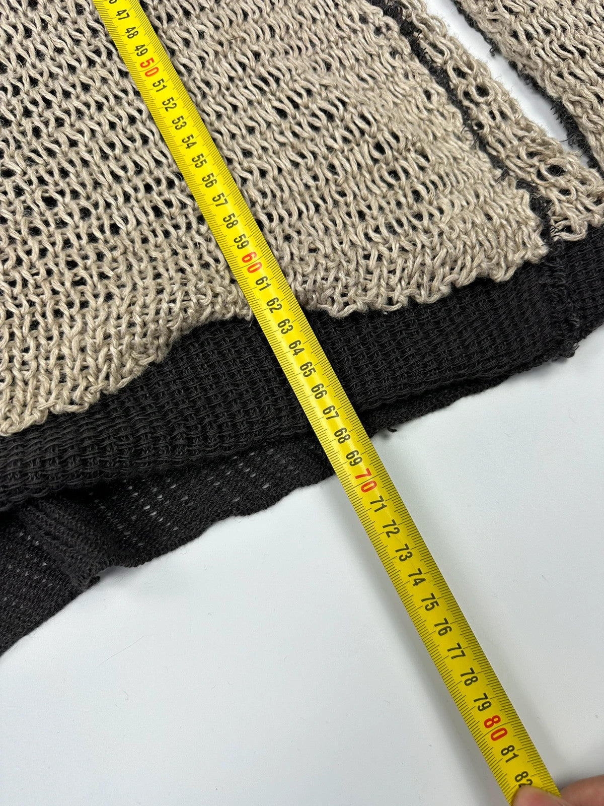 Dolce & Gabbana beige and brown knit sweater with visible stitching and fitted design.
