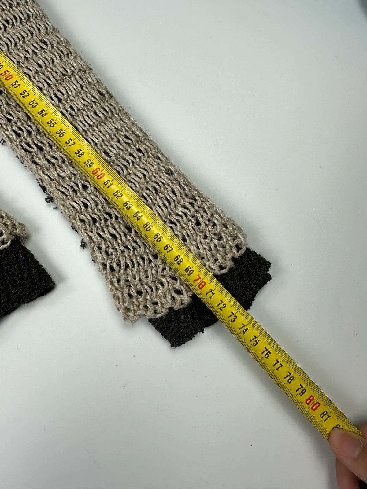 Dolce & Gabbana beige and brown knit sweater with visible stitching and fitted design.
