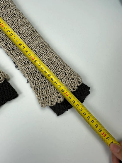 Dolce & Gabbana beige and brown knit sweater with visible stitching and fitted design.