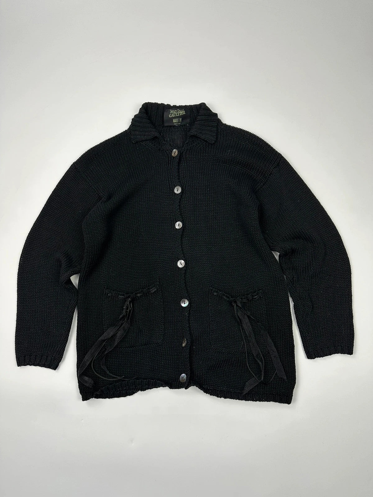 Jean-Paul Gaultier black knit cardigan with unique texture and minimalist design.