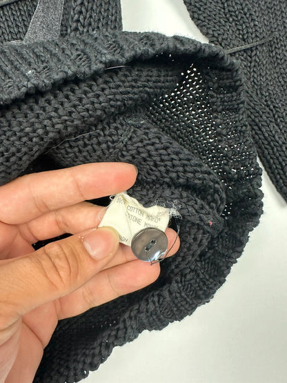 Jean-Paul Gaultier black knit cardigan with unique texture and minimalist design.