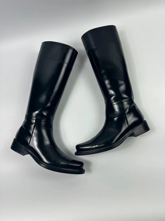 Prada black patent leather pointy toe boots with logo detail and original dustbag.