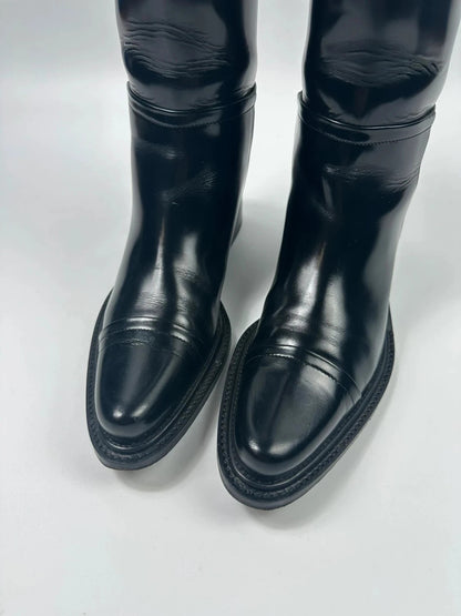 Prada black patent leather pointy toe boots with logo detail and original dustbag.