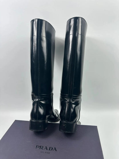 Prada black patent leather pointy toe boots with logo detail and original dustbag.