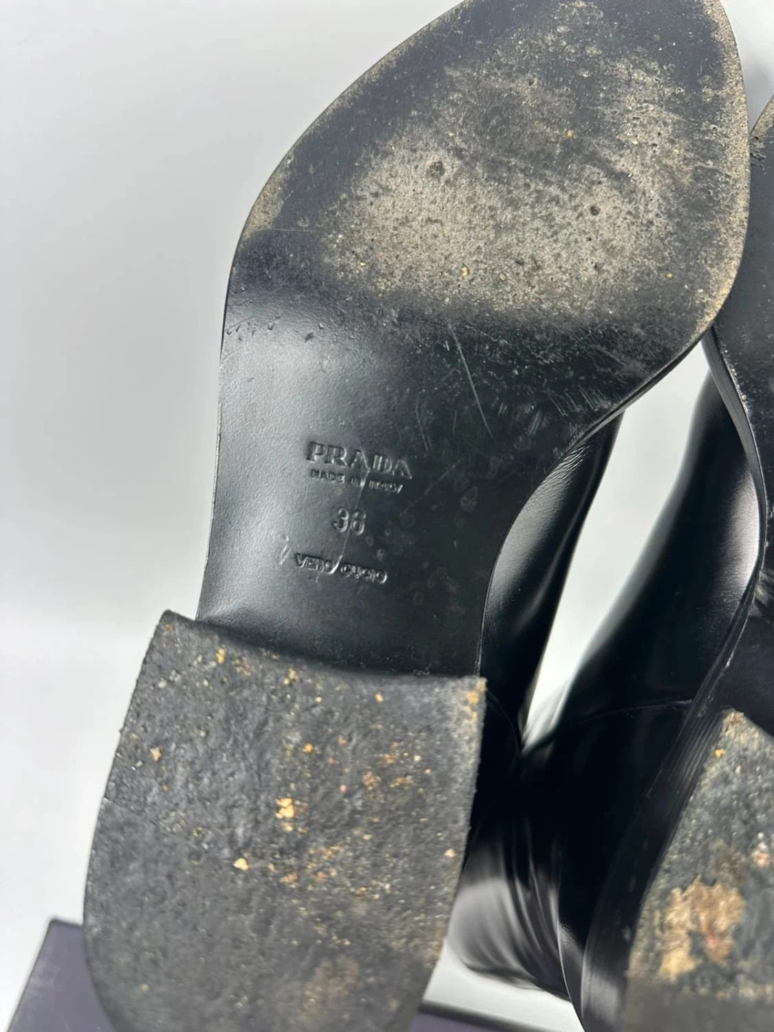 Prada black patent leather pointy toe boots with logo detail and original dustbag.