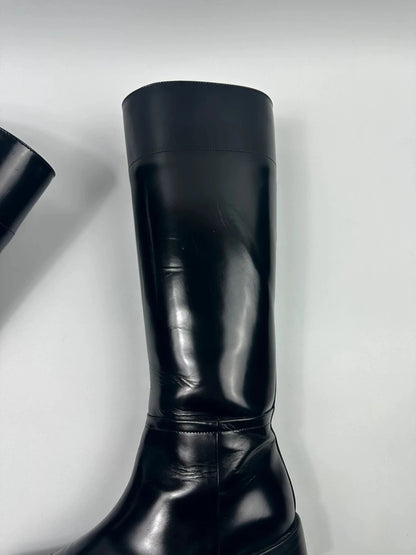 Prada black patent leather pointy toe boots with logo detail and original dustbag.