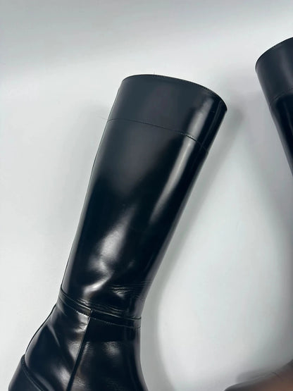 Prada black patent leather pointy toe boots with logo detail and original dustbag.