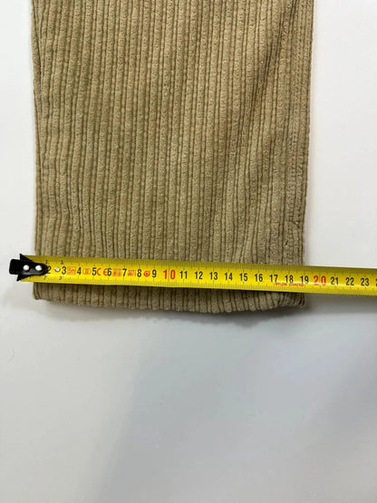 Dolce & Gabbana beige wide-leg trousers corduroy fabric with vintage design details.