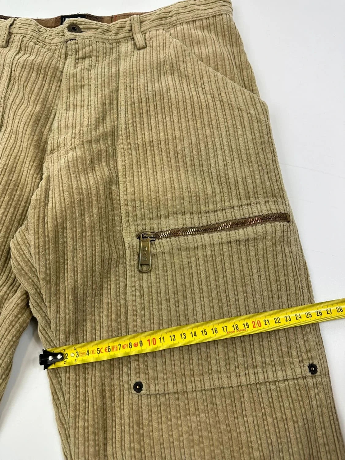 Dolce & Gabbana beige wide-leg trousers corduroy fabric with vintage design details.