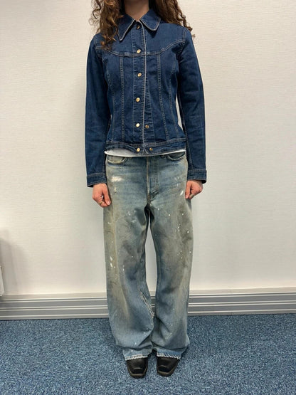 Dolce & Gabbana blue denim jacket with logo detail and vintage 2000s style.