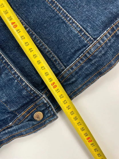 Dolce & Gabbana blue denim jacket with logo detail and vintage 2000s style.