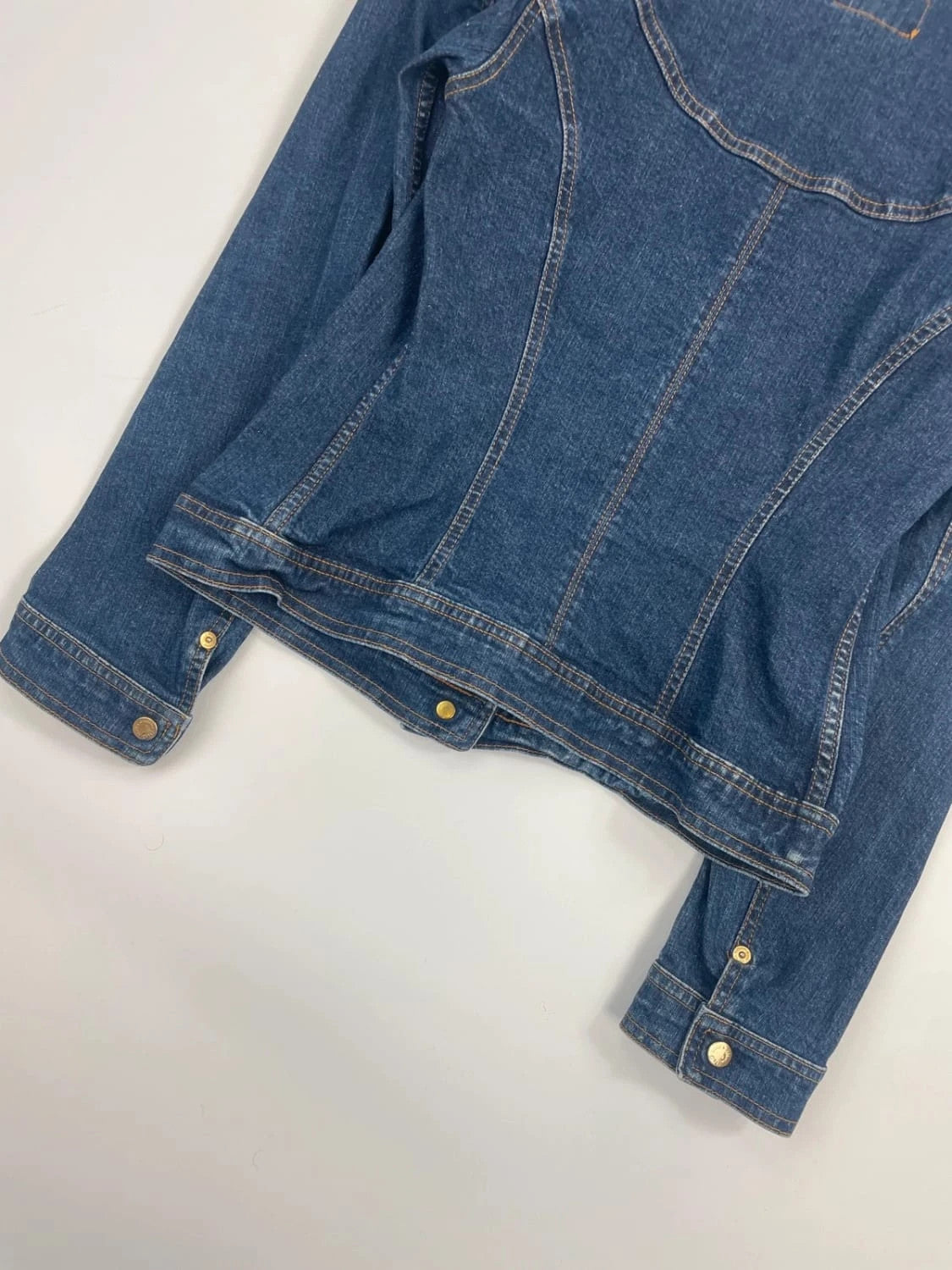 Dolce & Gabbana blue denim jacket with logo detail and vintage 2000s style.