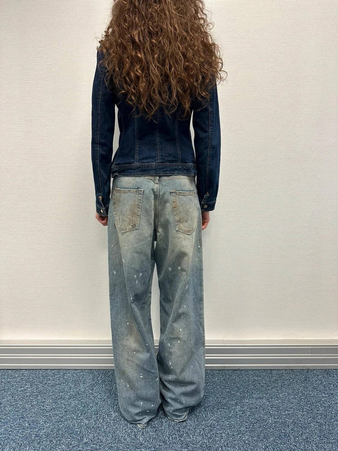 Dolce & Gabbana blue denim jacket with logo detail and vintage 2000s style.