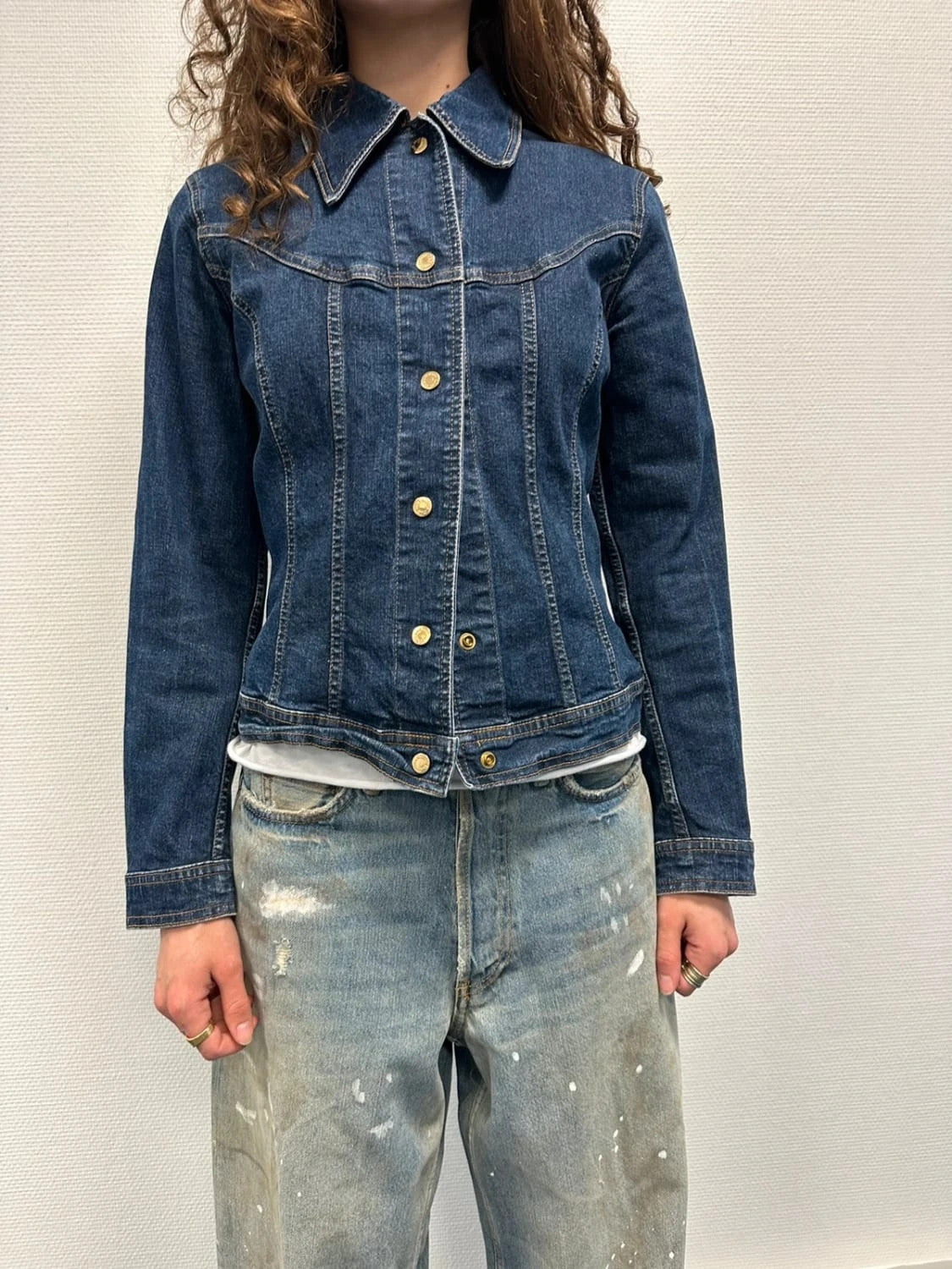 Dolce & Gabbana blue denim jacket with logo detail and vintage 2000s style.