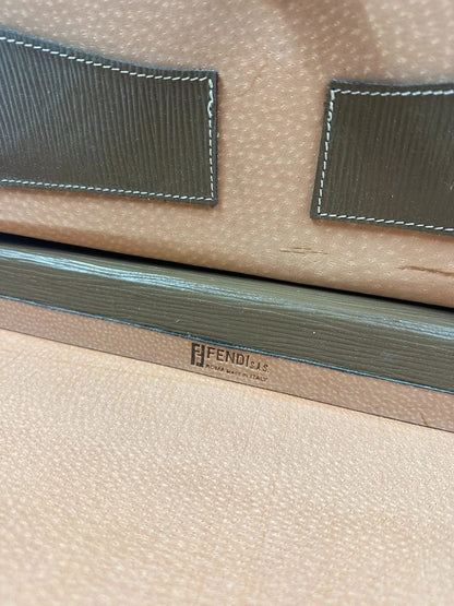 Fendi beige and brown briefcase with 70s FF monogram pattern and leather material.