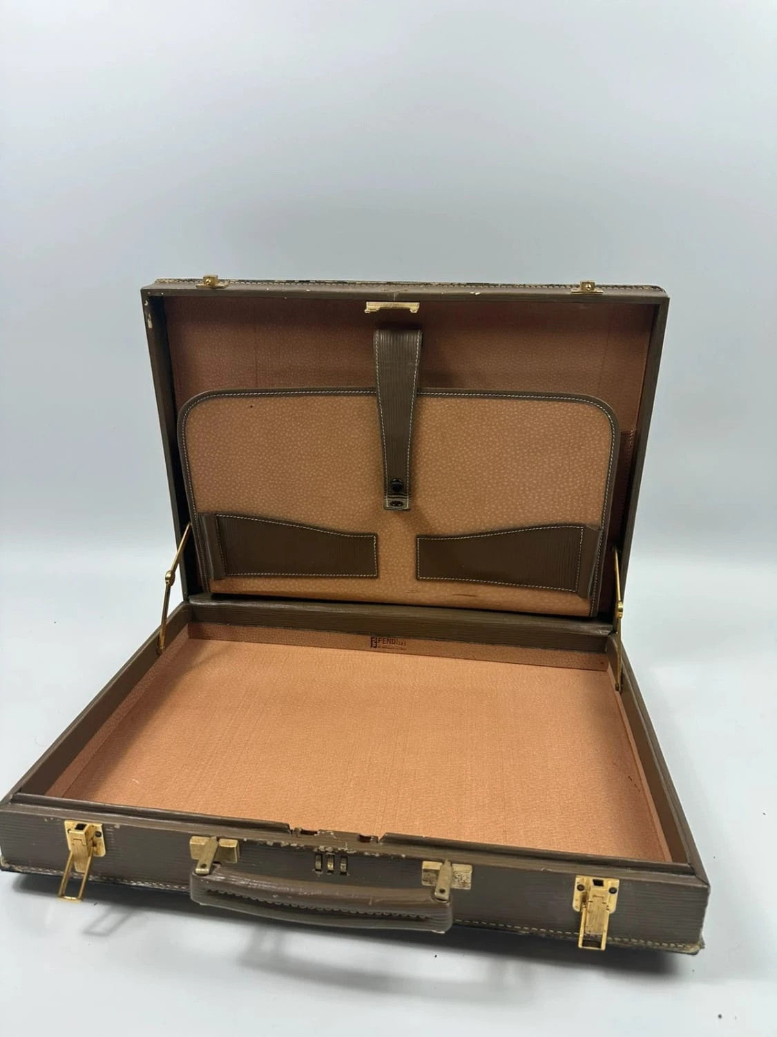 Fendi beige and brown briefcase with 70s FF monogram pattern and leather material.
