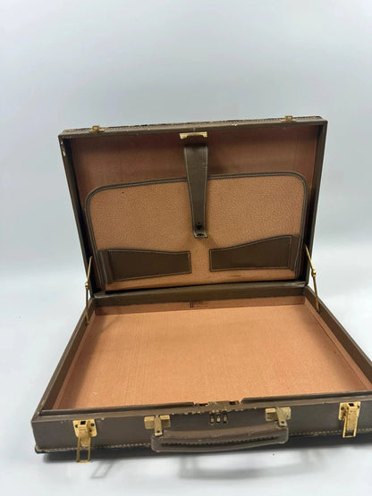 Fendi beige and brown briefcase with 70s FF monogram pattern and leather material.