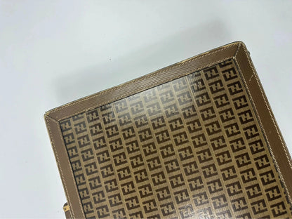 Fendi beige and brown briefcase with 70s FF monogram pattern and leather material.