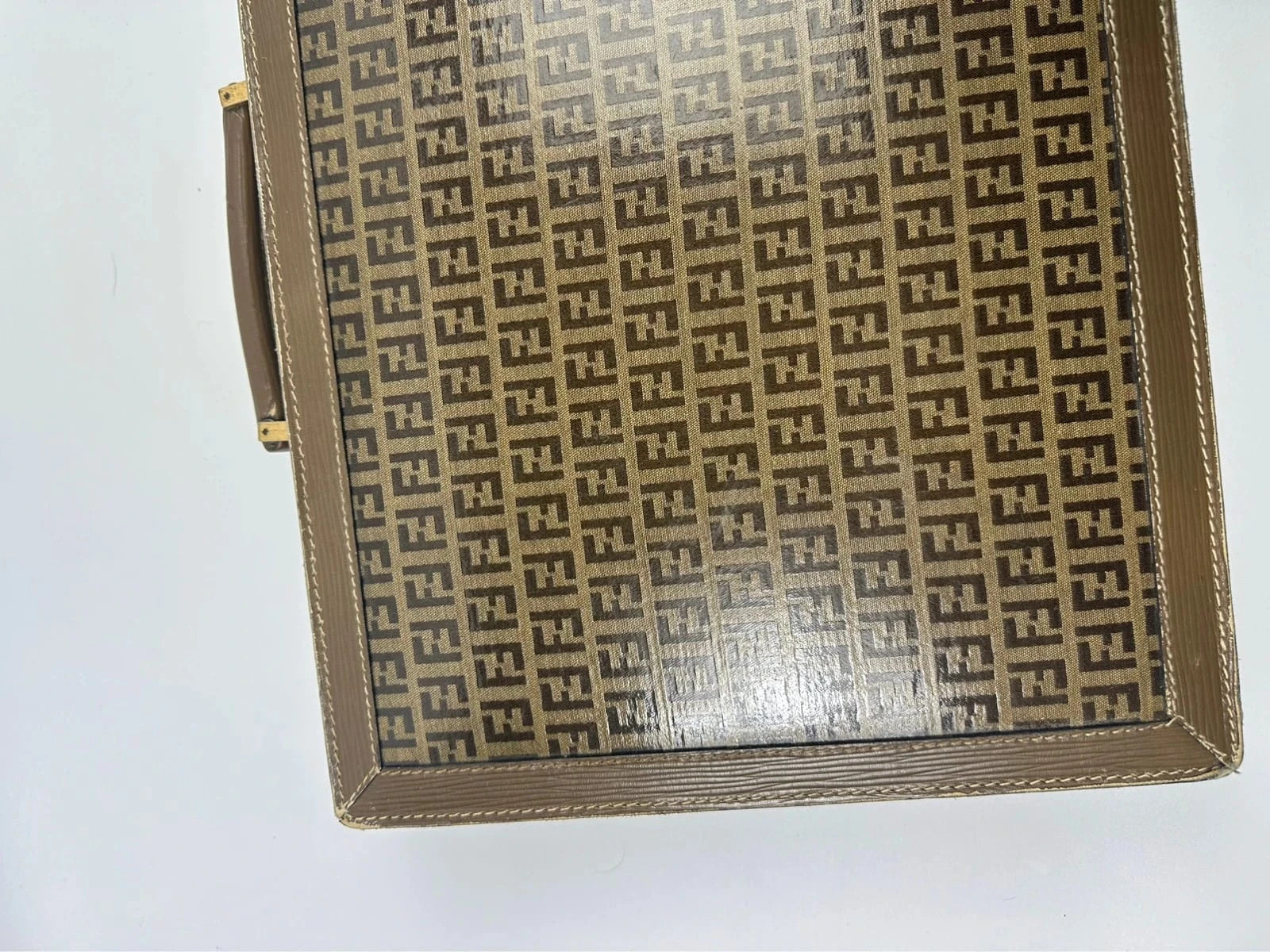 Fendi beige and brown briefcase with 70s FF monogram pattern and leather material.
