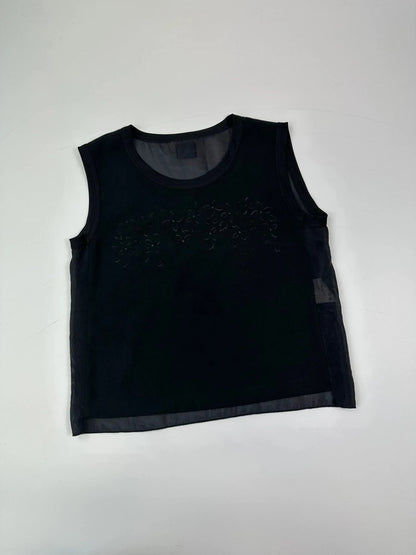 Marithé Francois Girbaud black tank top with floral laser cut details and sheer back.