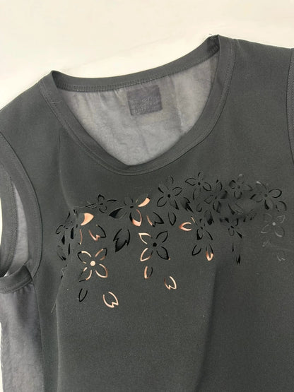 Marithé Francois Girbaud black tank top with floral laser cut details and sheer back.