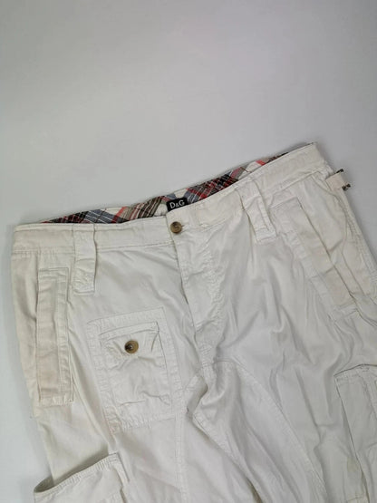 Dolce & Gabbana white wide-leg trousers with multiple pockets and adjustable drawstring waist.