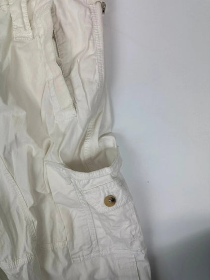 Dolce & Gabbana white wide-leg trousers with multiple pockets and adjustable drawstring waist.