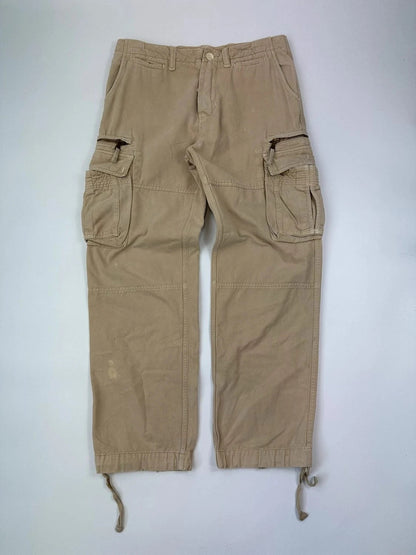 Dolce & Gabbana beige wide-leg trousers with logo on back pocket and adjustable drawstring.