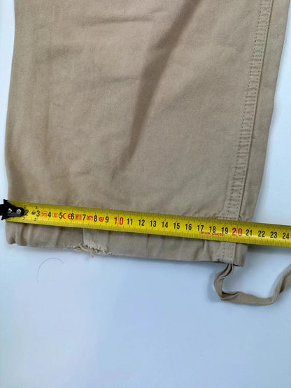Dolce & Gabbana beige wide-leg trousers with logo on back pocket and adjustable drawstring.