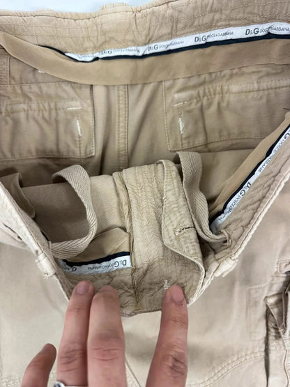 Dolce & Gabbana beige wide-leg trousers with logo on back pocket and adjustable drawstring.