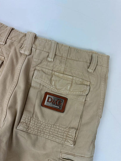 Dolce & Gabbana beige wide-leg trousers with logo on back pocket and adjustable drawstring.