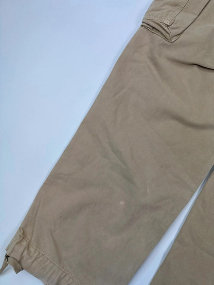 Dolce & Gabbana beige wide-leg trousers with logo on back pocket and adjustable drawstring.