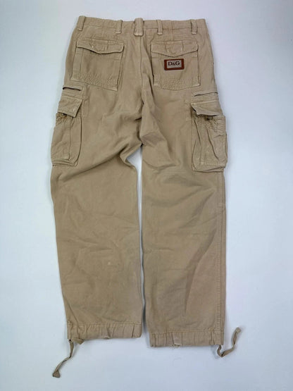 Dolce & Gabbana beige wide-leg trousers with logo on back pocket and adjustable drawstring.