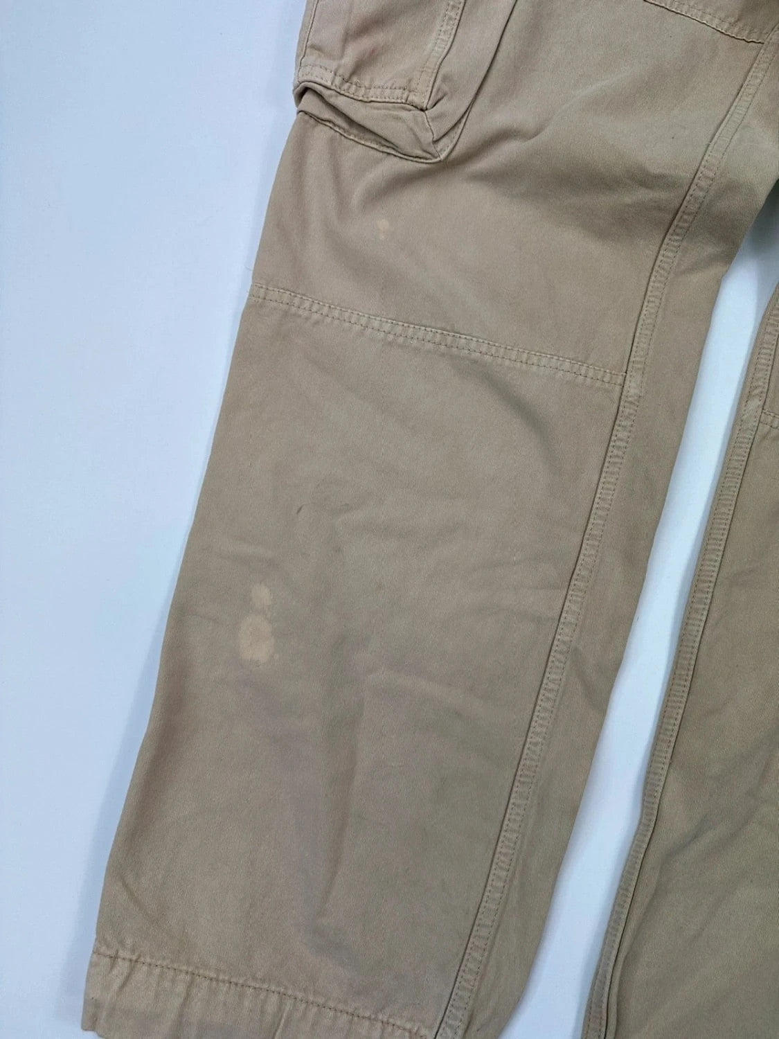 Dolce & Gabbana beige wide-leg trousers with logo on back pocket and adjustable drawstring.