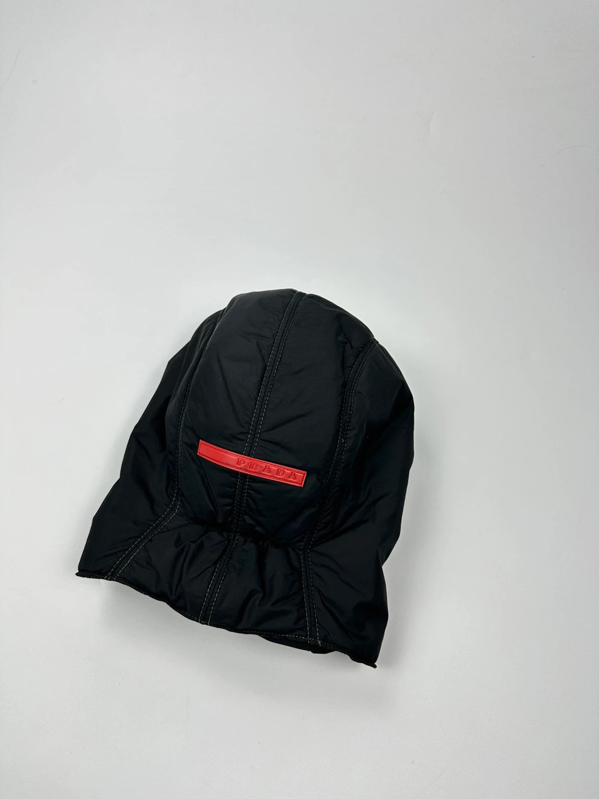 Prada black balaclava nylon material with logo detail from FW99 collection.