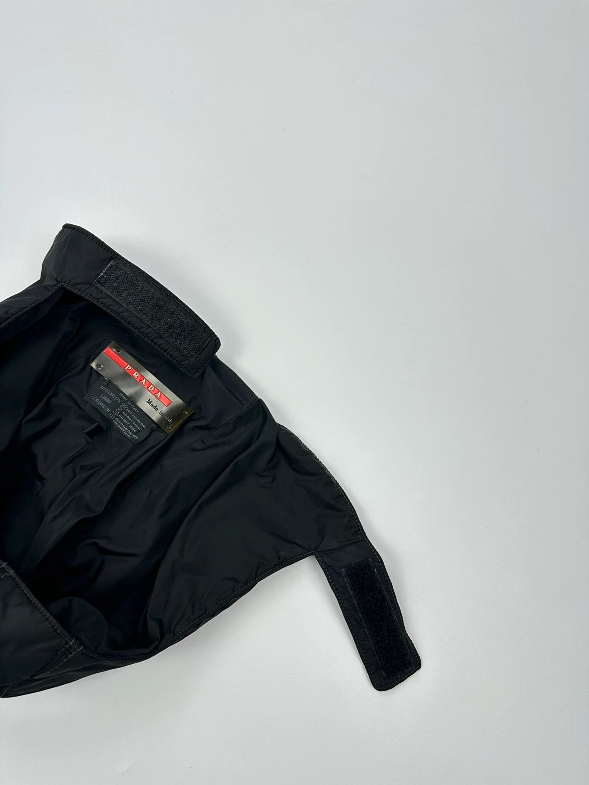 Prada black balaclava nylon material with logo detail from FW99 collection.
