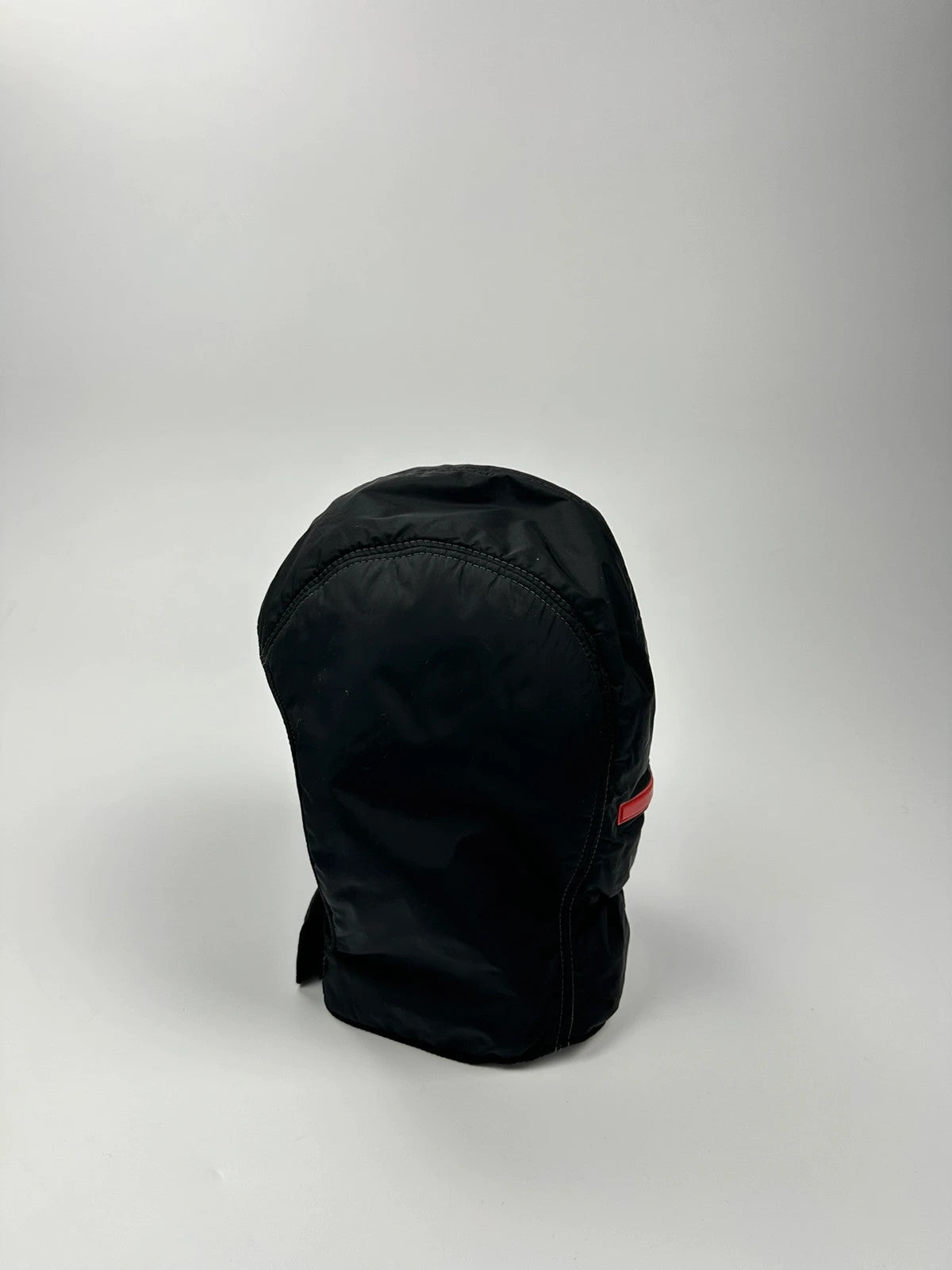 Prada black balaclava nylon material with logo detail from FW99 collection.