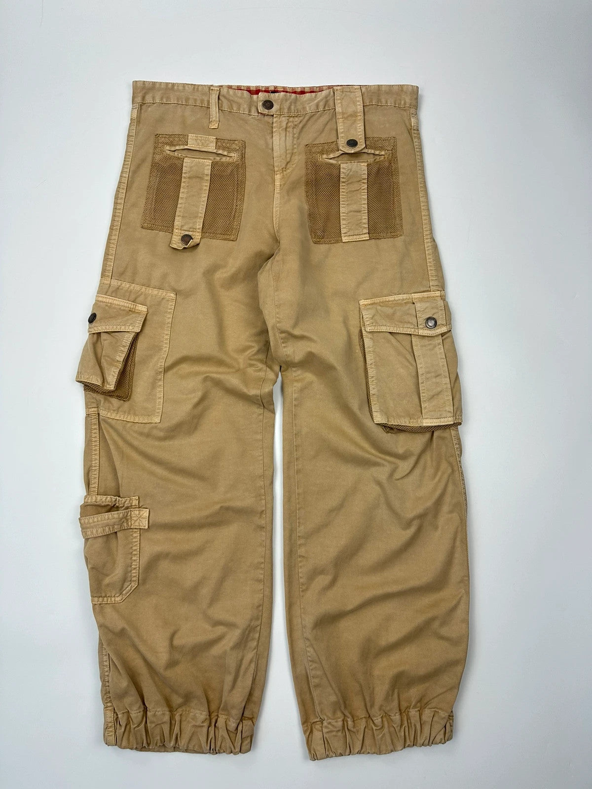 Dolce & Gabbana beige wide-leg trousers with cargo pockets and vintage 2003 design.