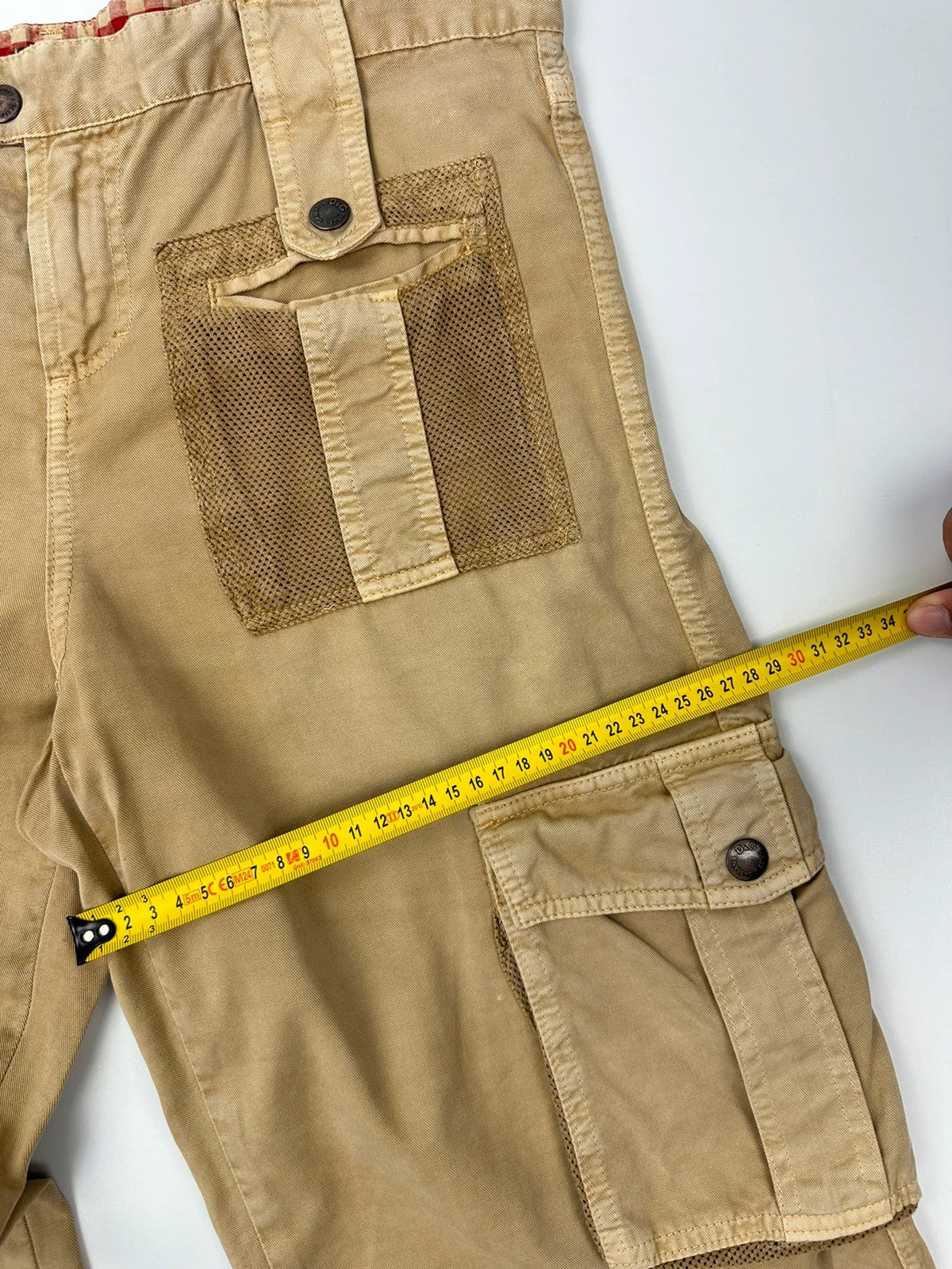 Dolce & Gabbana beige wide-leg trousers with cargo pockets and vintage 2003 design.