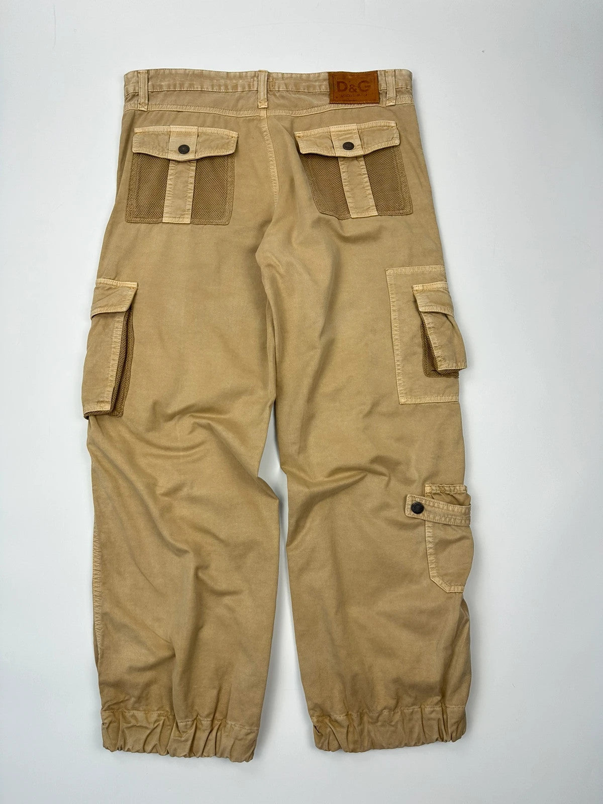 Dolce & Gabbana beige wide-leg trousers with cargo pockets and vintage 2003 design.