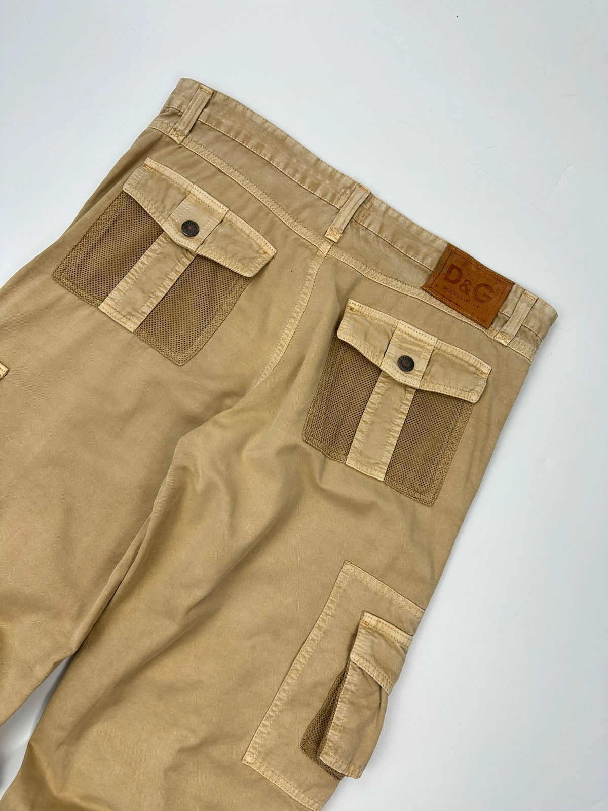 Dolce & Gabbana beige wide-leg trousers with cargo pockets and vintage 2003 design.