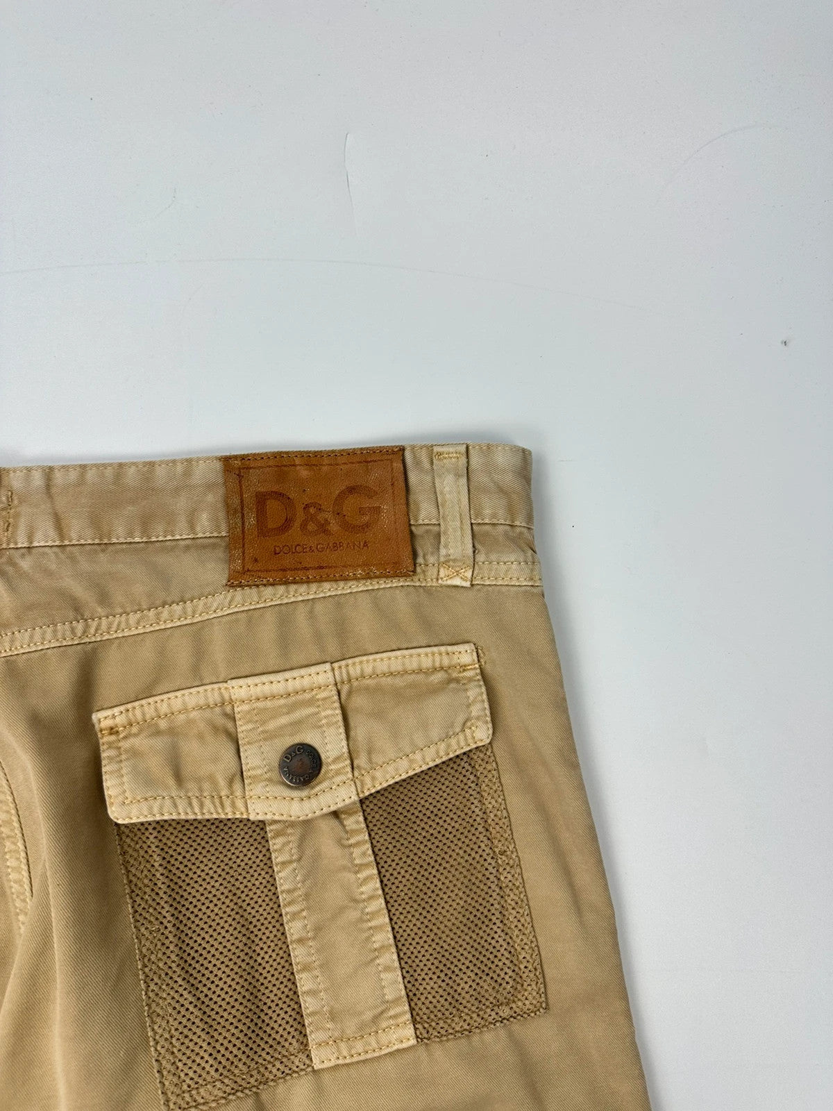 Dolce & Gabbana beige wide-leg trousers with cargo pockets and vintage 2003 design.