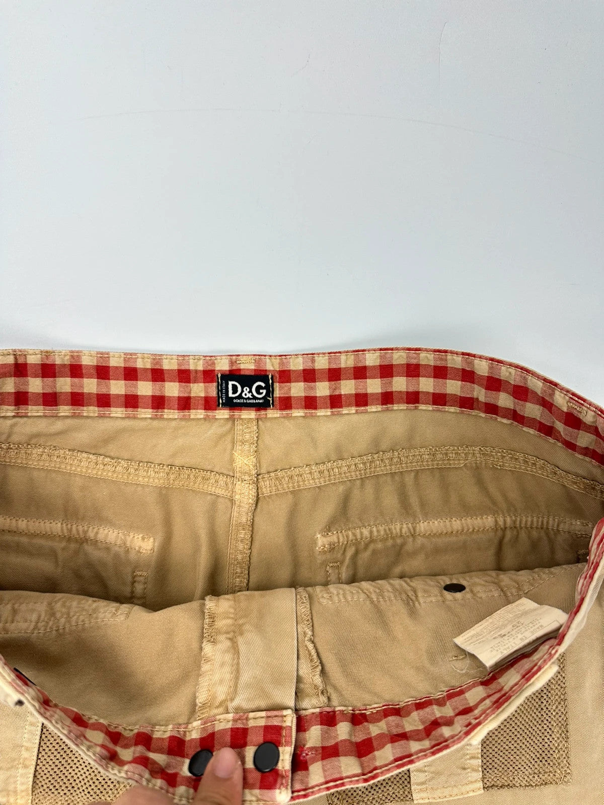 Dolce & Gabbana beige wide-leg trousers with cargo pockets and vintage 2003 design.