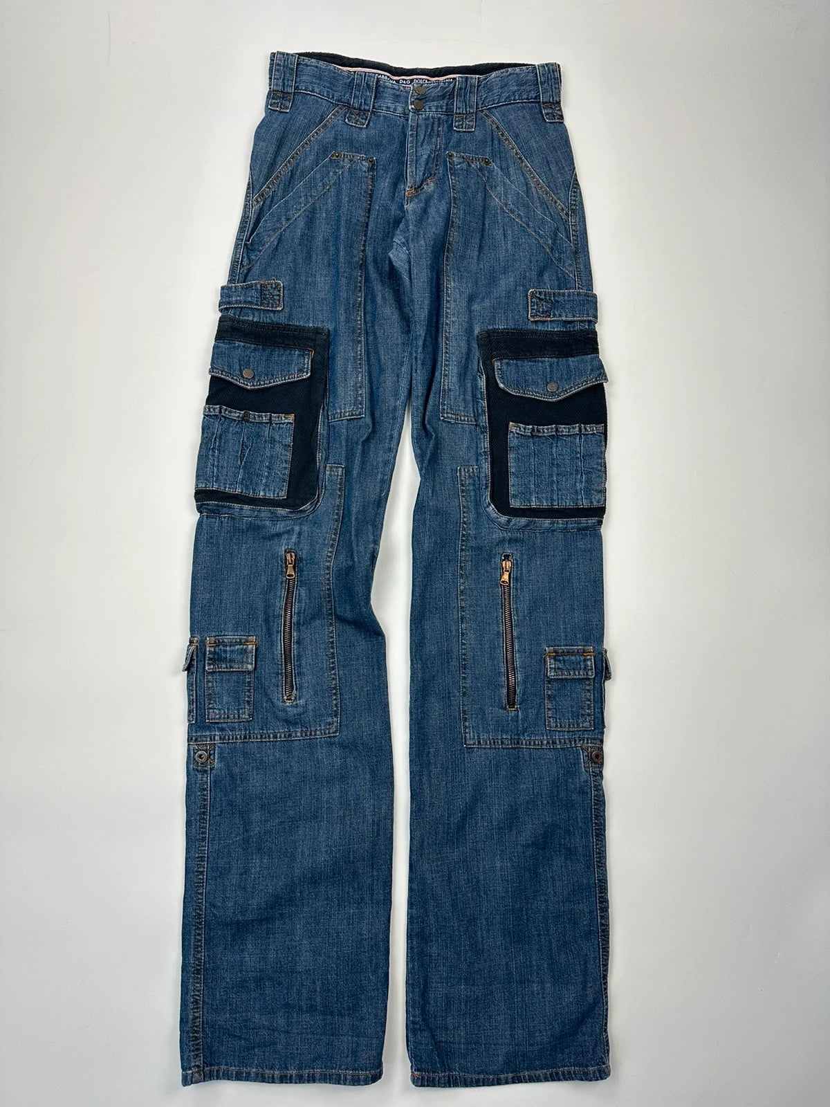 Dolce & Gabbana blue straight jeans with cargo pockets and mesh detailing from SS03 collection.