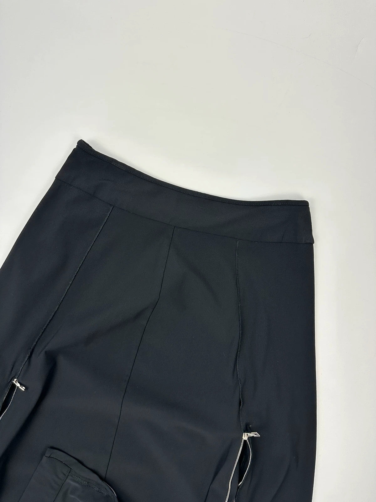 Marithé Francois Girbaud black mini skirt with double zip detail at the back.